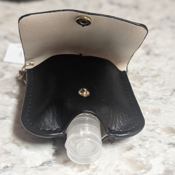 Black Leather Cross Hand Sanitizer Holder Keychain - Picture 2 of 4